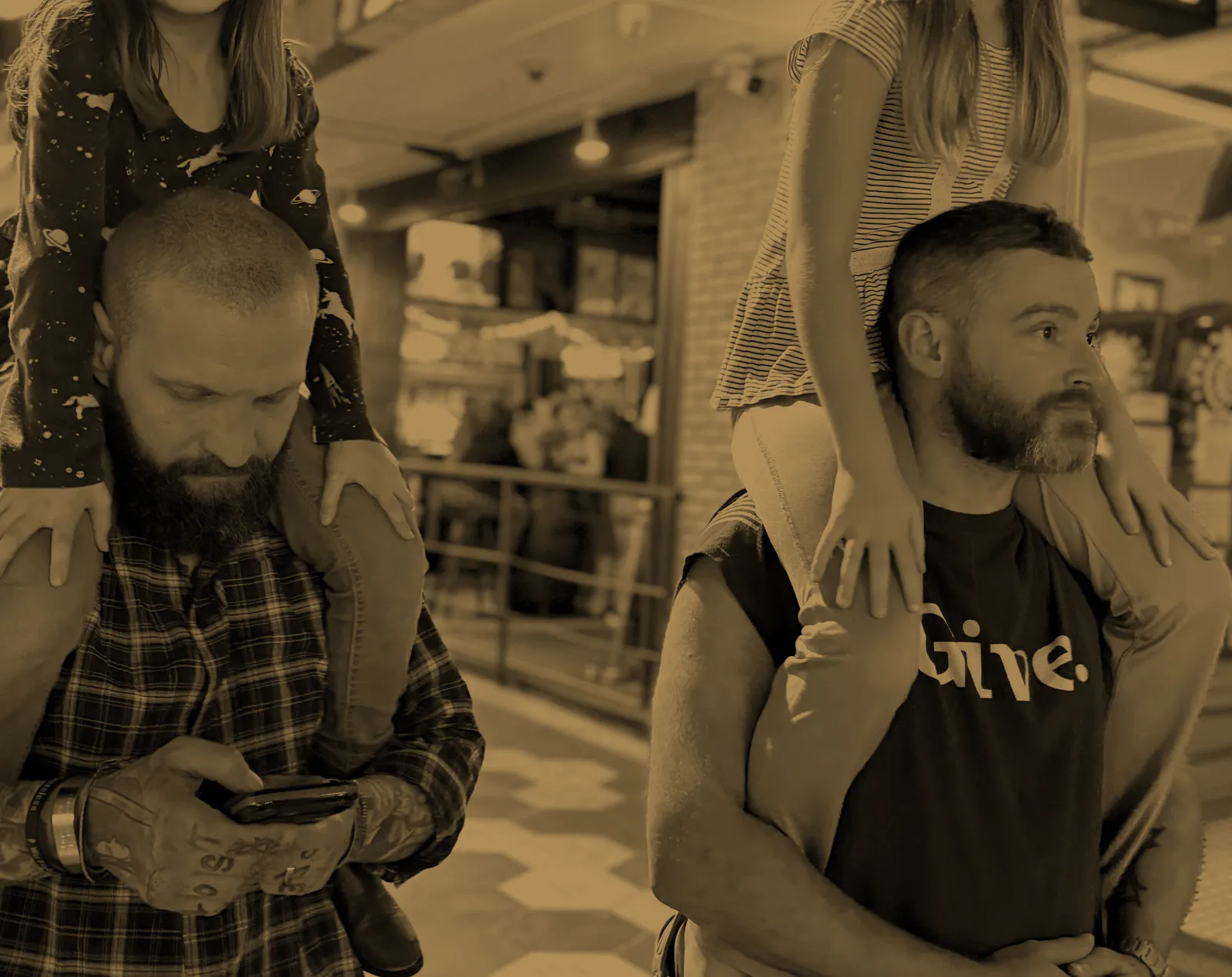 The BlackRifle Co. founders, kids on shoulders, duotone treatment